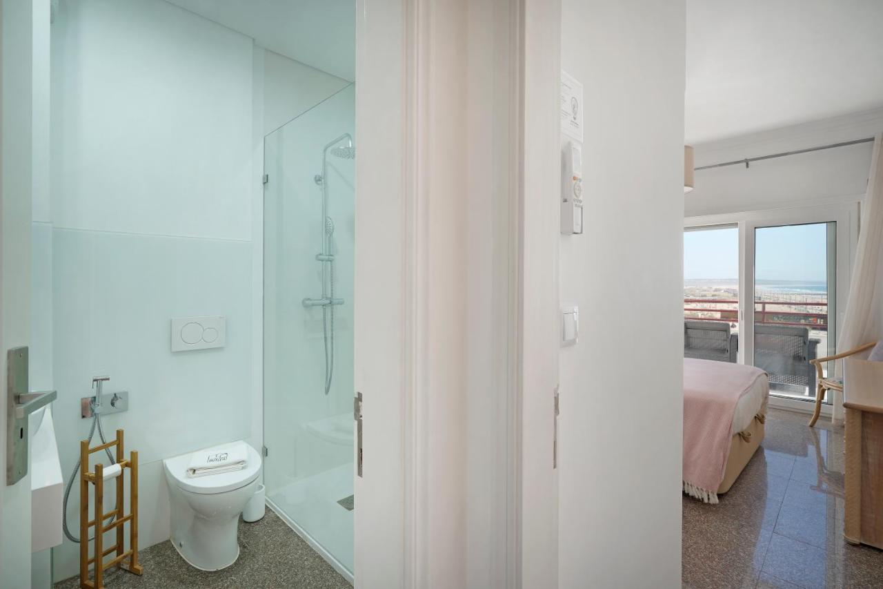 Costa Beach Apartment By The Portuguese Butler Costa da Caparica Exterior foto